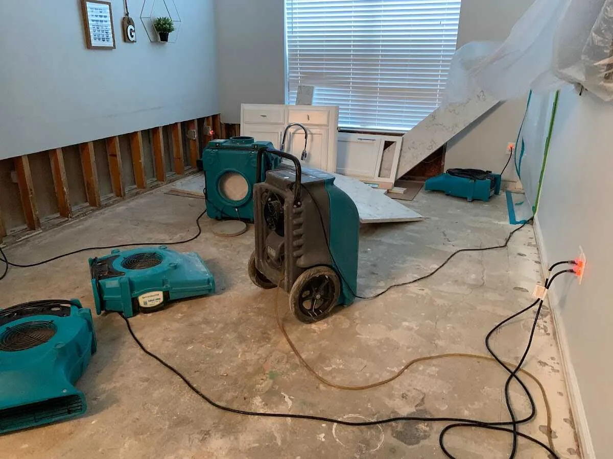 Dehumidifier in flood-cut room for Water Damage Restoration in Candlewick Lake